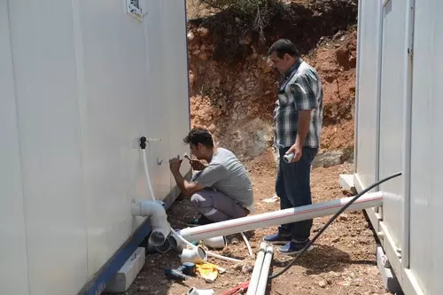 Kumluca'daki Yangında Evleri Hasara Gören Ailelere Konteyner Evler Teslim Edildi