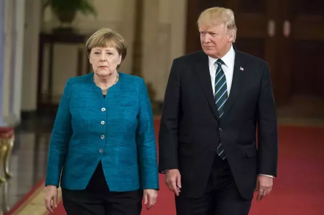 Trump, Merkel’in elini niçin sıkmadığını anlattı Trump, Merkel’in elini niçin sıkmadığını anlattı