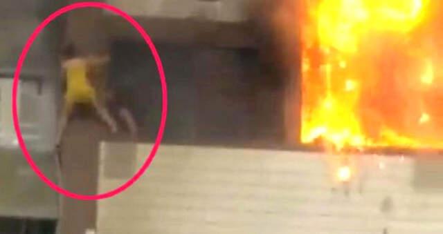Oteldeki Yangında Pencereden Atlayan Belaruslu Kadını Havada Yakalamış