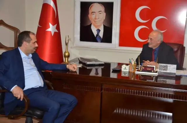 Ak Partili Balta'dan MHP'ye Çat Kapı Ziyaret Ak Partili Balta'dan MHP'ye Çat Kapı Ziyaret