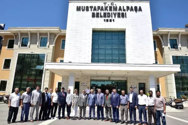 Büyükataman'dan Başkan Kurtulan'a Ziyaret Büyükataman'dan Başkan Kurtulan'a Ziyaret