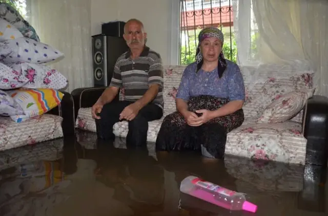 Evini Su Basan Kadın: