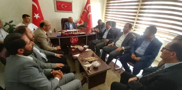 AK Parti'den MHP'ye Nezaket Ziyareti AK Parti'den MHP'ye Nezaket Ziyareti
