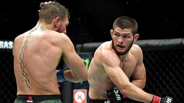 https://foto.haberler.com/haber/2018/10/10/putin-mcgregor-u-yenerek-sampiyon-olan-khabib-11319467_87_m.jpg