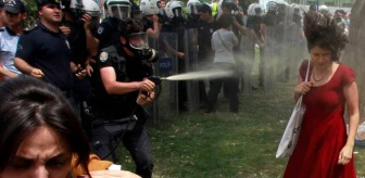 Gezi Parkı'nda 'Kırmızılı Kadının' Yüzüne Biber Gazı Sıktıran Ramazan Emekli Hakkında Yakalama Kararı Çıkarıldı