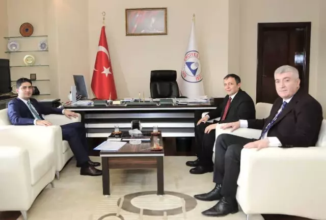 MHP Milletvekili Özdemir'den, Erü Rektörü Çalış'a Ziyaret MHP Milletvekili Özdemir'den, Erü Rektörü Çalış'a Ziyaret