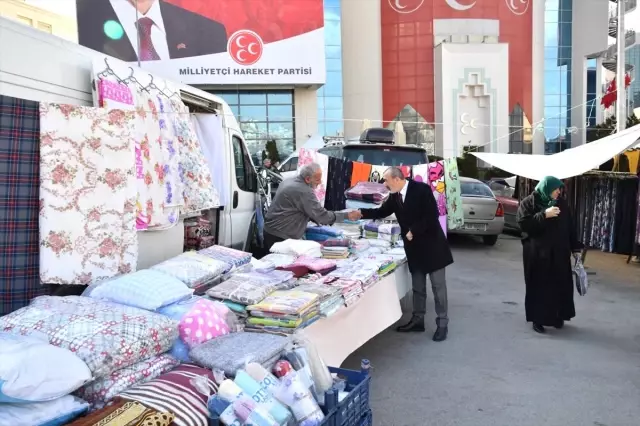 MHP'den Pazar Ziyareti MHP'den Pazar Ziyareti