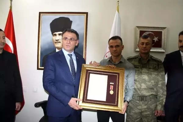 Tokat'ta 15 Temmuz Gazilerine Övünç Madalyası Verildi Tokat'ta 15 Temmuz Gazilerine Övünç Madalyası Verildi