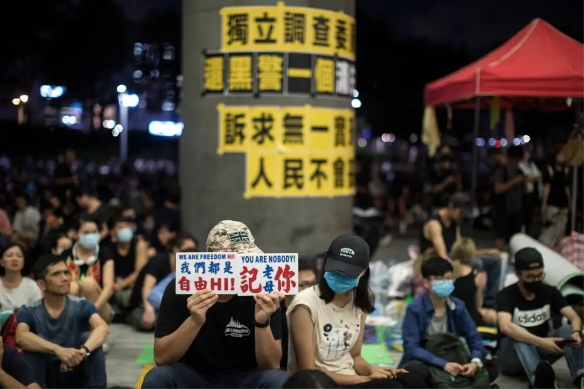 Hong Kong'da göstericiler G20 liderlerinden harekete geçmelerini istedi