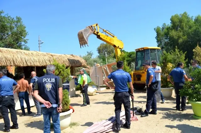 Didim'de kaçak yapıların yıkımı kısa sürdü