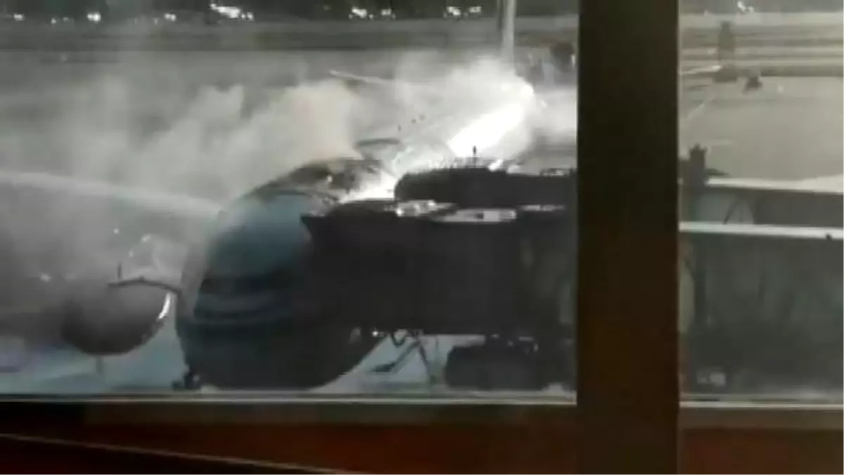 Çin'de yolcu alan uçakta yangın paniği