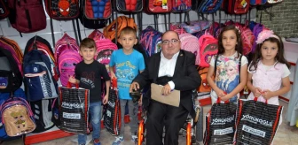 Engelli gençten 12 öğrenciye okul kıyafeti desteği