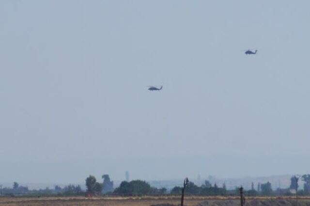 Ortak devriyedeki helikopterleri gören teröristler, kazıyı bıraktı