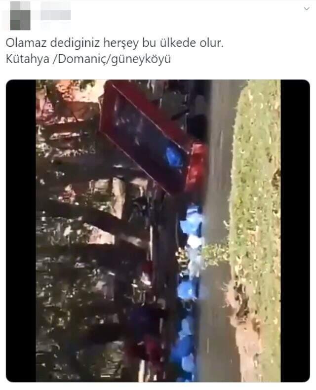 Kütahya'da bir şahıs onlarca poşeti nehre döktü