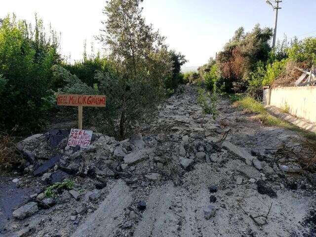 50 yıldır kullanılan yol 'Özel mülkiyettir' yazısıyla kapatıldı, mahalleli mağdur oldu