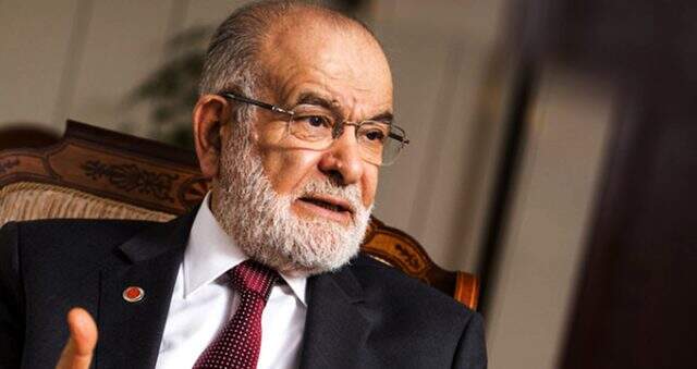 Karamollaoğlu'nun konuşması bozkurt işareti yapan grup tarafından engellenmek istedi