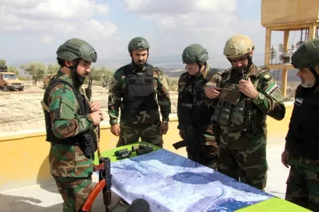 Suriye Geçici Hükümetine bağlı Suriye Milli Ordusu'ndan PYD-PKK'ya gözdağı Suriye Geçici Hükümetine bağlı Suriye Milli Ordusu'ndan PYD-PKK'ya gözdağı