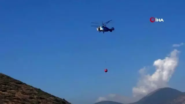 Bakras Kalesi'nde çıkan yangına havadan müdahale Bakras Kalesi'nde çıkan yangına havadan müdahale