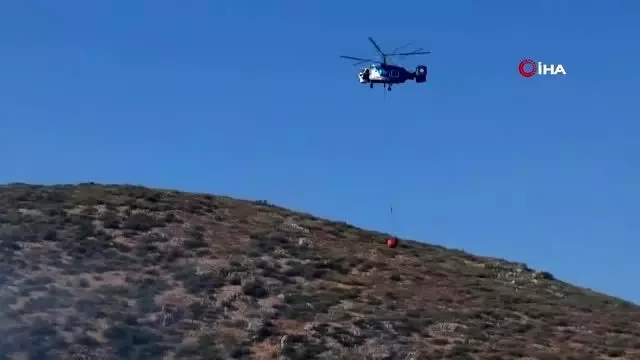 Bakras Kalesi'nde çıkan yangına havadan müdahale Bakras Kalesi'nde çıkan yangına havadan müdahale