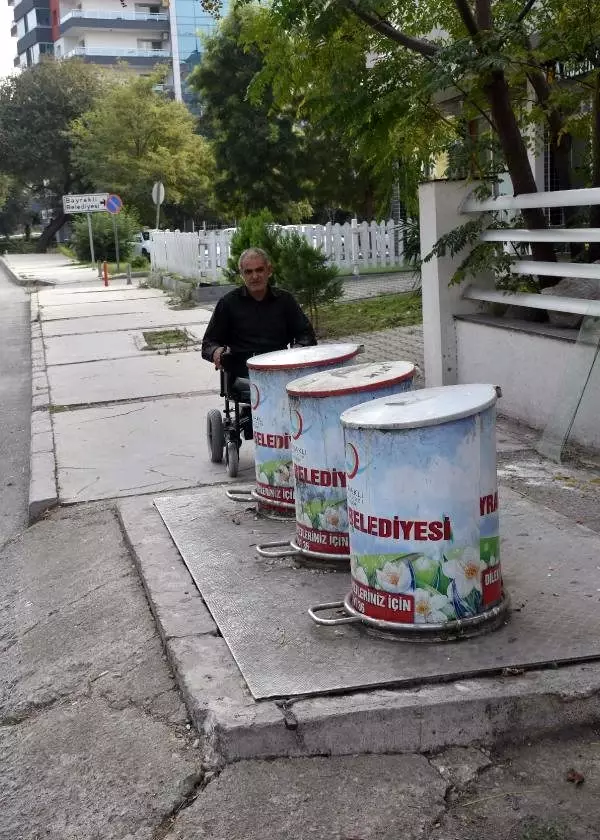 Engellilere çöp tankı engeli Engellilere çöp tankı engeli