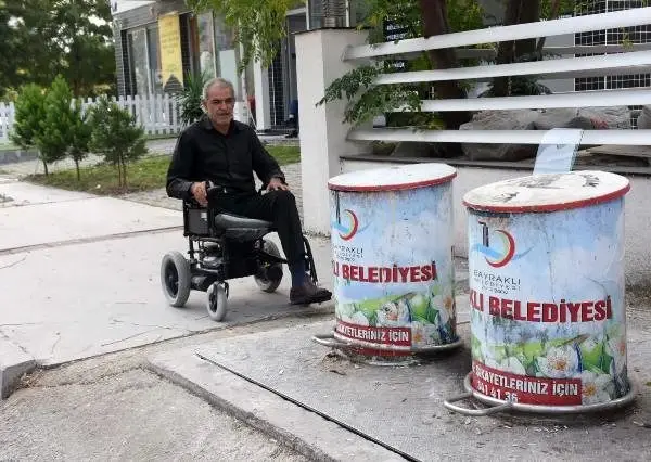 Engellilere çöp tankı engeli Engellilere çöp tankı engeli