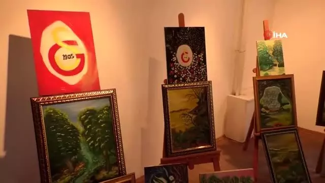 Ağzı ile yaptığı resimlerle ikinci sergisini açtı Ağzı ile yaptığı resimlerle ikinci sergisini açtı