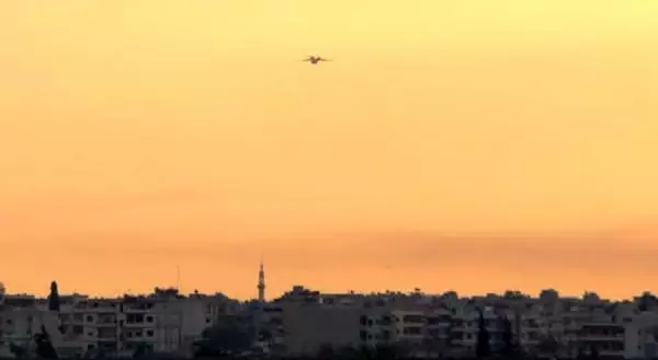 Rus askerlerini taşıyan uçak, Kamışlı'ya indi Rus askerlerini taşıyan uçak, Kamışlı'ya indi