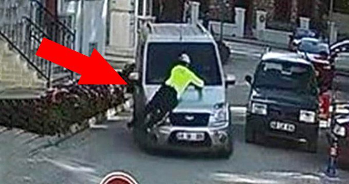 Polis memurunu araç kaportasında metrelerce sürükleyen sürücü tutuklandı