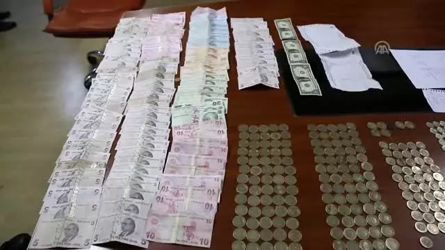 Dilencinin üzerinden 2 bin 280 lira çıktı Dilencinin üzerinden 2 bin 280 lira çıktı