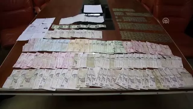 Dilencinin üzerinden 2 bin 280 lira çıktı Dilencinin üzerinden 2 bin 280 lira çıktı