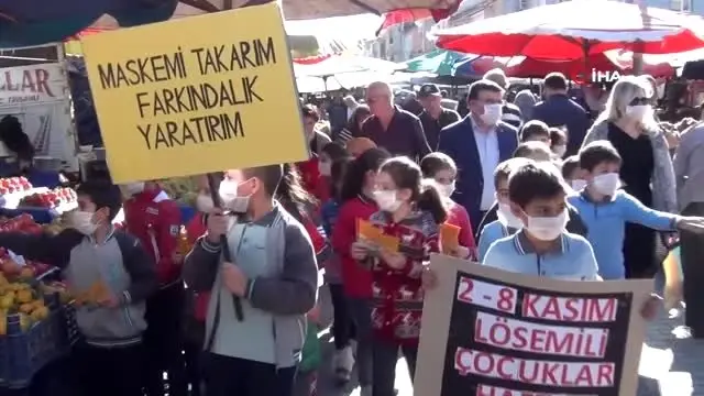 Lösemili çocuklar için maske takıp pazar yerinde dolaştılar Lösemili çocuklar için maske takıp pazar yerinde dolaştılar