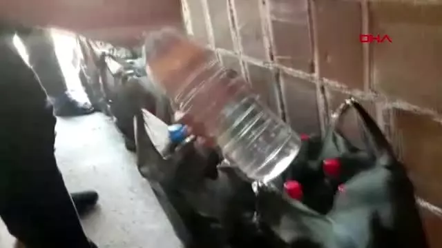 Adana'da 4 bin 255 litre sahte içki ele geçirildi Adana'da 4 bin 255 litre sahte içki ele geçirildi