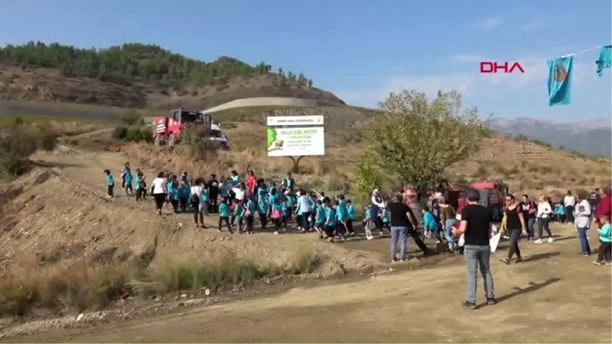 Alaköprü barajı'nda fidanlar toprakla buluşturuldu