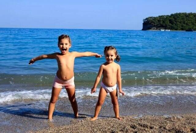 Antalya sahilleri ara tatilde hareketlendi! Sahiller doldu taştı