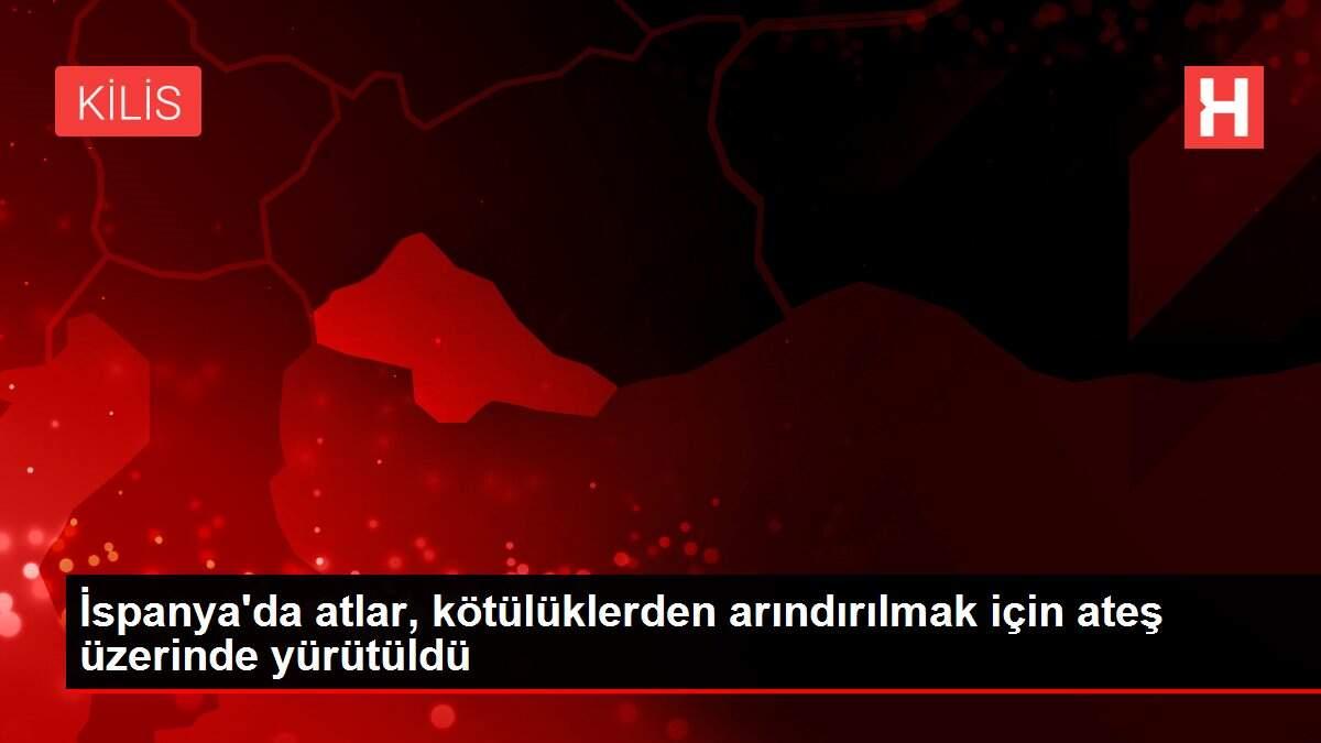 İspanya'da atlar, kötülüklerden arındırılmak için ateş üzerinde yürütüldü