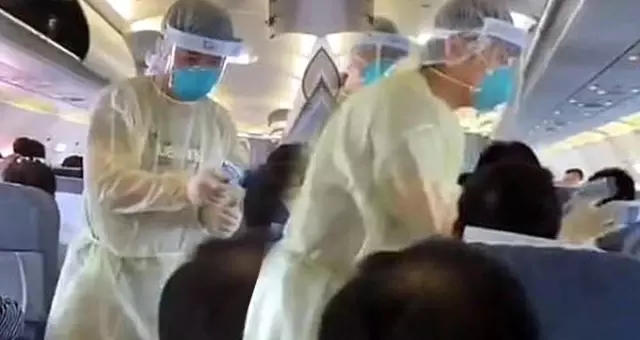 Çin'de coronavirüs salgını nedeniyle uçakta yapılan sağlık taraması dünyanın gündemine oturdu Çin'de coronavirüs salgını nedeniyle uçakta yapılan sağlık taraması dünyanın gündemine oturdu