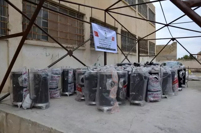 Tel Abyad ve Rasulayn'daki okullara soba ve yakacak desteği Tel Abyad ve Rasulayn'daki okullara soba ve yakacak desteği