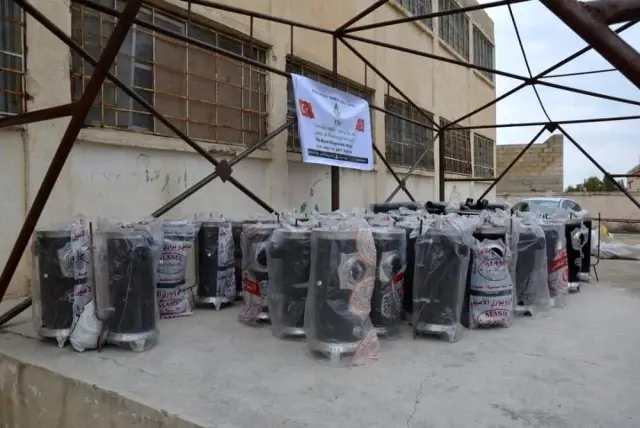 Tel Abyad ve Resulayn'da çocuklar üşümeyecek