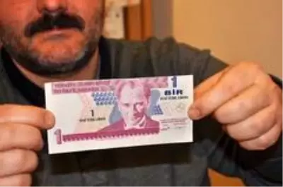 Kesim hatalı 1 YTL'si için 100 bin TL istiyor Kesim hatalı 1 YTL'si için 100 bin TL istiyor