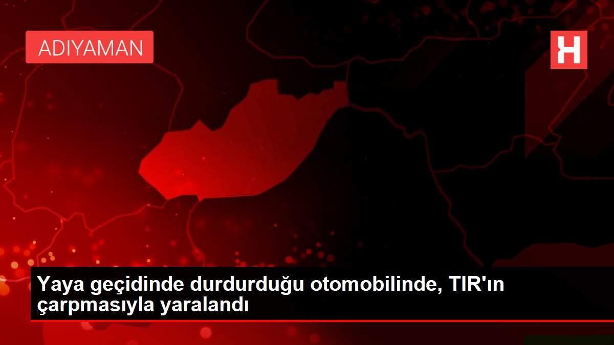 Yaya geçidinde durdurduğu otomobilinde, TIR'ın çarpmasıyla yaralandı