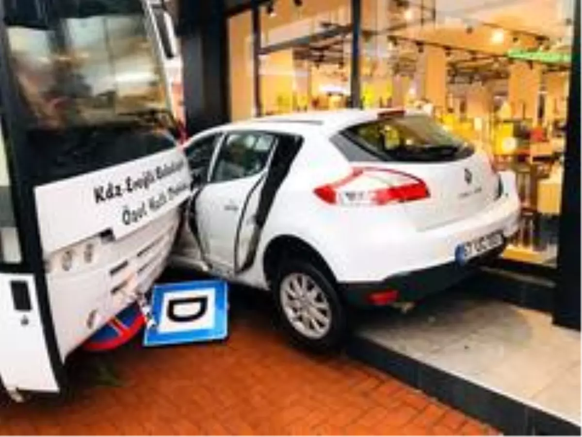 Otobüsün sürüklediği otomobil mağazaya girmekten son anda kurtuldu