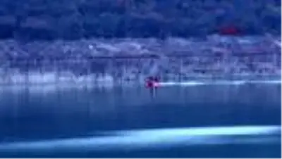 Tunceli üniversiteli gülistan, debisi düşürülen baraj gölünde arandı