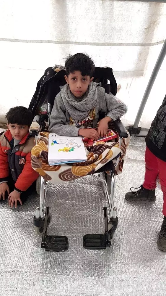Göçmen çocukların yüzünü Bahçeli güldürdü Göçmen çocukların yüzünü Bahçeli güldürdü