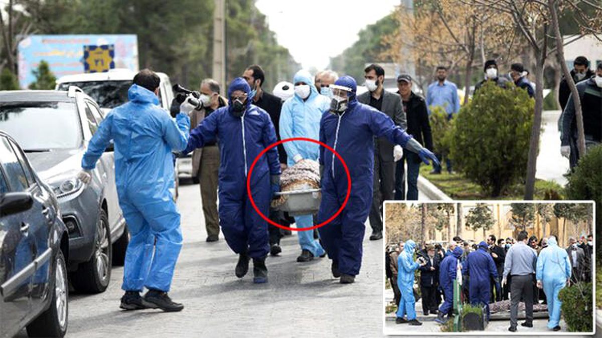 Koronavirüsten ölen İranlı milletvekilinin cenazesini özel giysili görevliler taşıdı