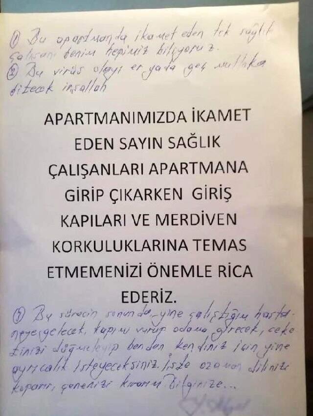 Sağlık çalışanının oturduğu apartmana yazılan yazı tepki çekti Sağlık çalışanının oturduğu apartmana yazılan yazı tepki çekti