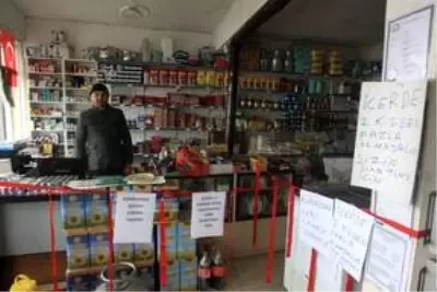 Seyahat yasağı iki şehri ayıran caddede uygulanamıyor