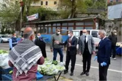 Belen'de semt pazarı esnafı ve vatandaşlara korona virüs uyarısı