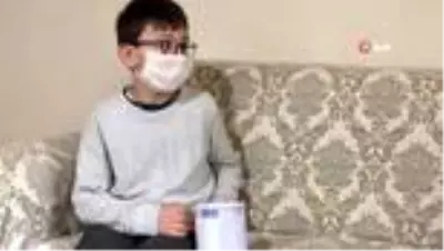 6 yıldır biriktirdiği kumbarasını Milli Dayanışma Kampanyası'na bağışladı 6 yıldır biriktirdiği kumbarasını Milli Dayanışma Kampanyası'na bağışladı