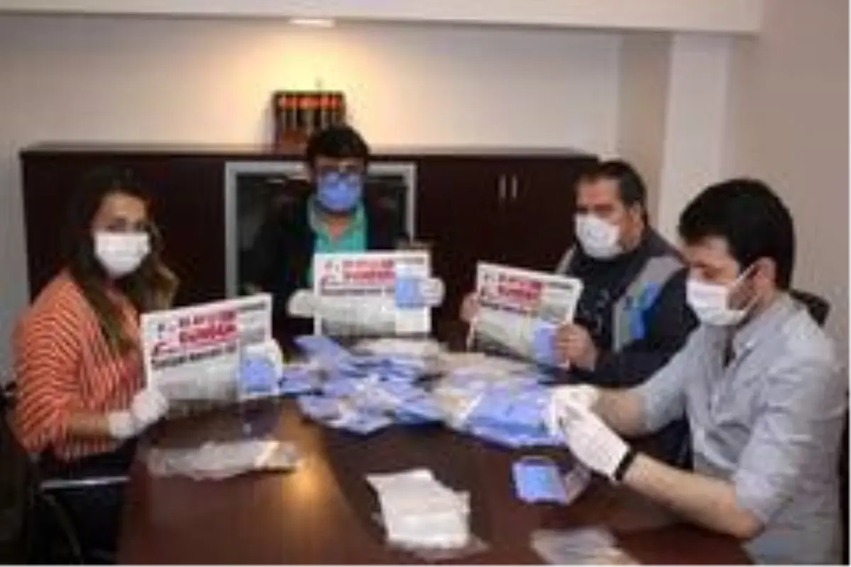 Bolu'da yerel gazete abonelerine maske dağıttı