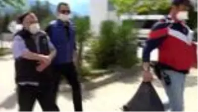 Oğlunu çekiçle öldürüp yakmaya çalışan baba adliyeye sevk edildi